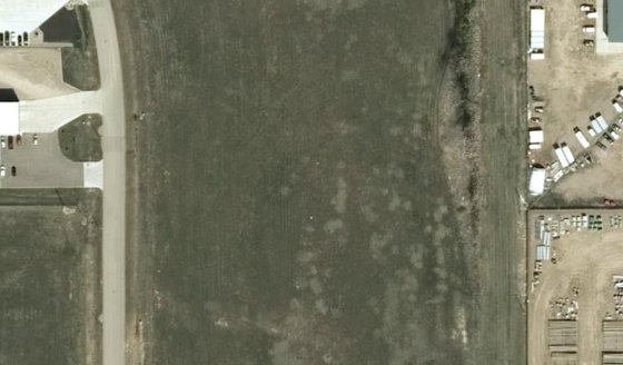 Satellite view of PLAN 1524312 BLOCK 2 LOT 27 in City of Lloydminster, with the parcel boundary outlined
