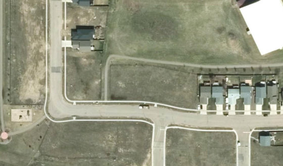 Satellite view of PLAN 1522663 BLOCK 6 LOT 82 in City of Lloydminster, with the parcel boundary outlined