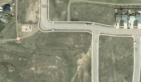 Satellite view of PLAN 1522663 BLOCK 18 LOT 50 in City of Lloydminster, with the parcel boundary outlined