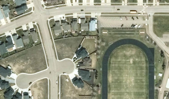Satellite view of PLAN 1522663 BLOCK 6 LOT 58 in City of Lloydminster, with the parcel boundary outlined