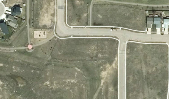 Satellite view of PLAN 1522663 BLOCK 18 LOT 51 in City of Lloydminster, with the parcel boundary outlined