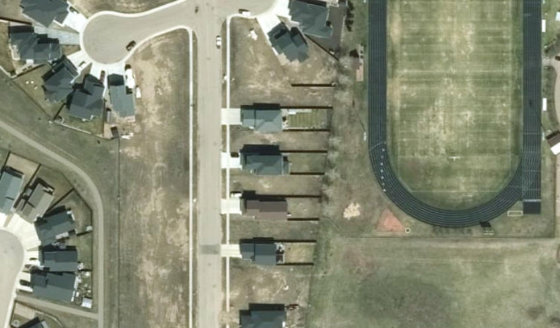 Satellite view of PLAN 1522663 BLOCK 6 LOT 66 in City of Lloydminster, with the parcel boundary outlined