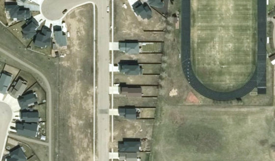 Satellite view of PLAN 1522663 BLOCK 6 LOT 67 in City of Lloydminster, with the parcel boundary outlined