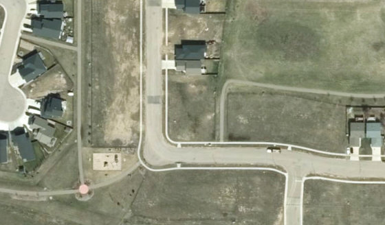 Satellite view of PLAN 1522663 BLOCK 6 LOT 77 in City of Lloydminster, with the parcel boundary outlined