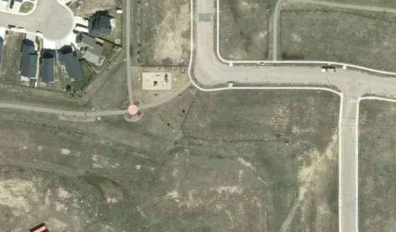 Satellite view of PLAN 1522663 BLOCK 18 LOT 54 in City of Lloydminster, with the parcel boundary outlined
