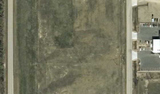 Satellite view of PLAN 1524312 BLOCK 4 LOT 13 in City of Lloydminster, with the parcel boundary outlined
