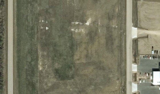 Satellite view of PLAN 1524312 BLOCK 4 LOT 12 in City of Lloydminster, with the parcel boundary outlined