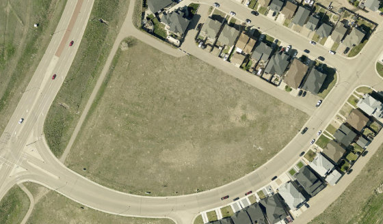Satellite view of 48 Ranchlands Boulevard NE in City of Medicine Hat, with the parcel boundary outlined