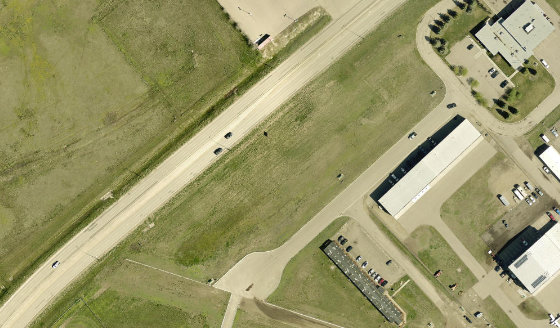 Satellite view of 15 Les Little Way SW in City of Medicine Hat, with the parcel boundary outlined