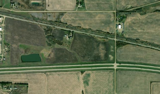 Satellite view of NE-19-50-8-W4 in County of Minburn No. 27, with the parcel boundary outlined