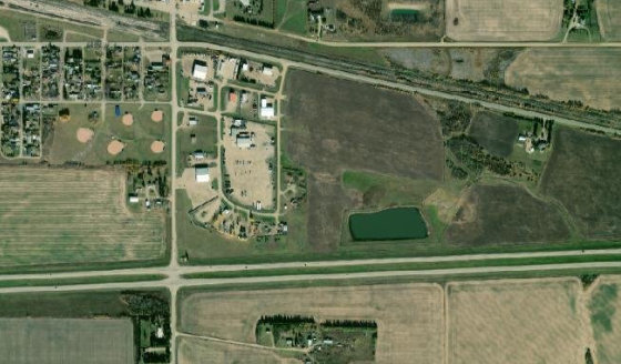 Satellite view of NW-19-50-8-W4 in County of Minburn No. 27, with the parcel boundary outlined