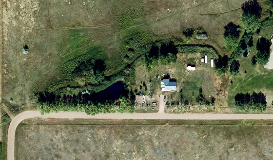 Satellite view of PLAN 8211747 BLOCK 1 LOT 1 in County of Newell, with the parcel boundary outlined