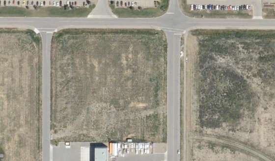 Satellite view of 3570 Giffen Rd N in City of Lethbridge, with the parcel boundary outlined