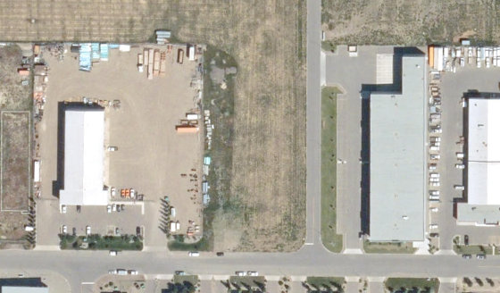 Satellite view of 3475-32 Ave N in City of Lethbridge, with the parcel boundary outlined
