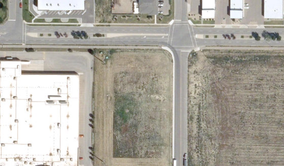 Satellite view of 2904-34 St N in City of Lethbridge, with the parcel boundary outlined