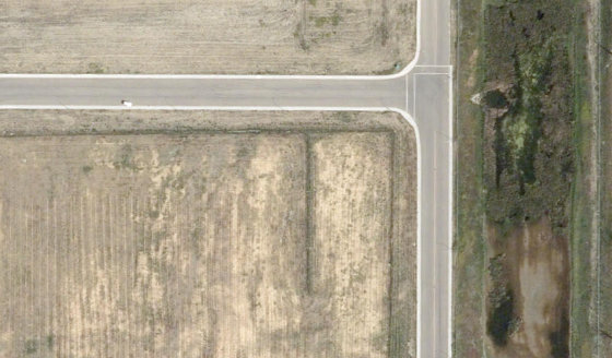 Satellite view of 4170-32 St N in City of Lethbridge, with the parcel boundary outlined