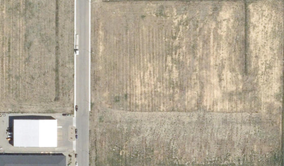 Satellite view of 4131-30 St N in City of Lethbridge, with the parcel boundary outlined