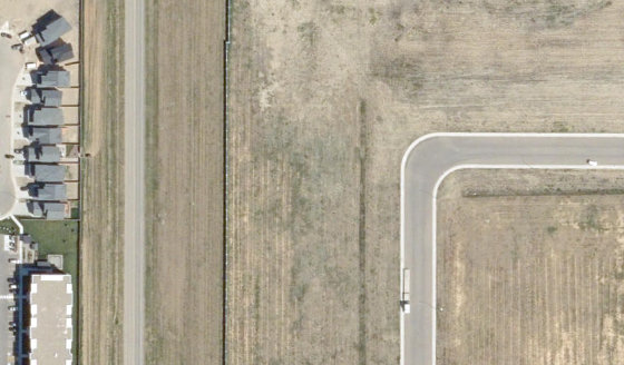 Satellite view of 4190-30 St N in City of Lethbridge, with the parcel boundary outlined