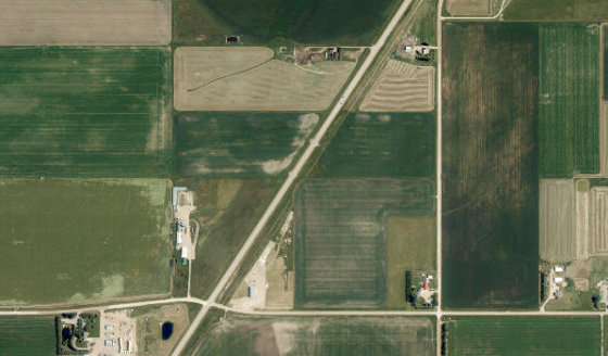 Satellite view of SE-28-5-22-W4 in Cardston County, with the quarter section this parcel sits inside outlined