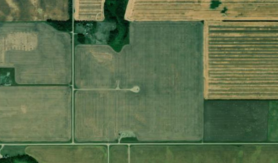 Satellite view of SW-5-35-24-W4 in Kneehill County, with the parcel boundary outlined