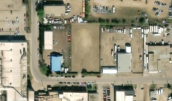 Satellite view of 9940-65 Avenue NW in City of Edmonton, with the parcel boundary outlined