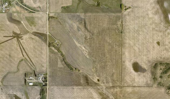 Satellite view of SW-10-34-27-W4 in Red Deer County, with the parcel boundary outlined