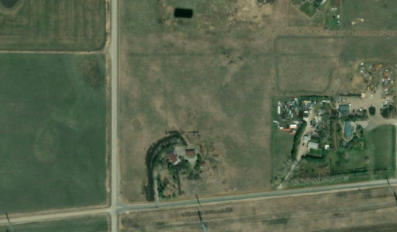 Satellite view of PLAN 731395 BLOCK 2 LOT 11 in Rocky View County, with the parcel boundary outlined