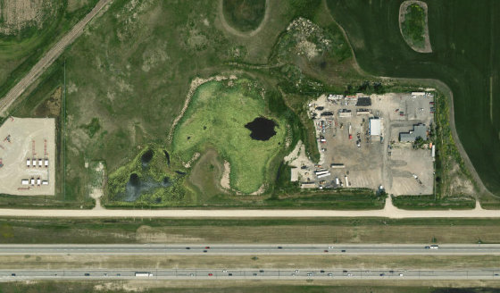 Satellite view of PLAN 8811045 LOT 1 in Rocky View County, with the parcel boundary outlined