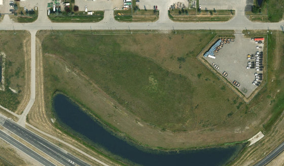 Satellite view of 7535 114 AV SE in City of Calgary, with the parcel boundary outlined
