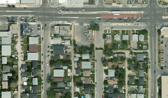Satellite view of 1813 43 St SE in City of Calgary, with the parcel boundary outlined