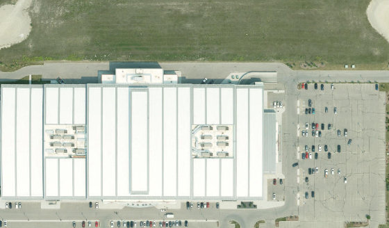Satellite view of CONDO PLAN 1810813 UNIT 222 in Rocky View County, with the parcel boundary outlined