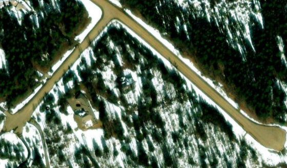 Satellite view of PLAN 8210453 BLOCK 2 LOT 31 in Rocky View County, with the parcel boundary outlined