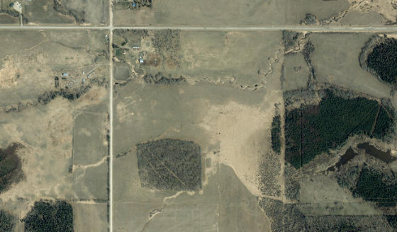 Satellite view of NW-22-51-7-W5 in Parkland County, with the parcel boundary outlined