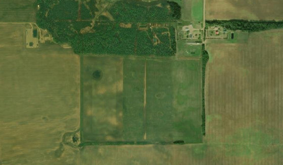 Satellite view of SE-7-106-14-W5 in Mackenzie County, with the parcel boundary outlined