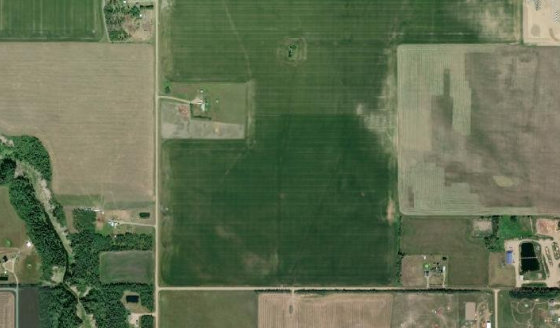 Satellite view of SW-4-79-13-W6 in Saddle Hills County, with the quarter section this parcel sits inside outlined